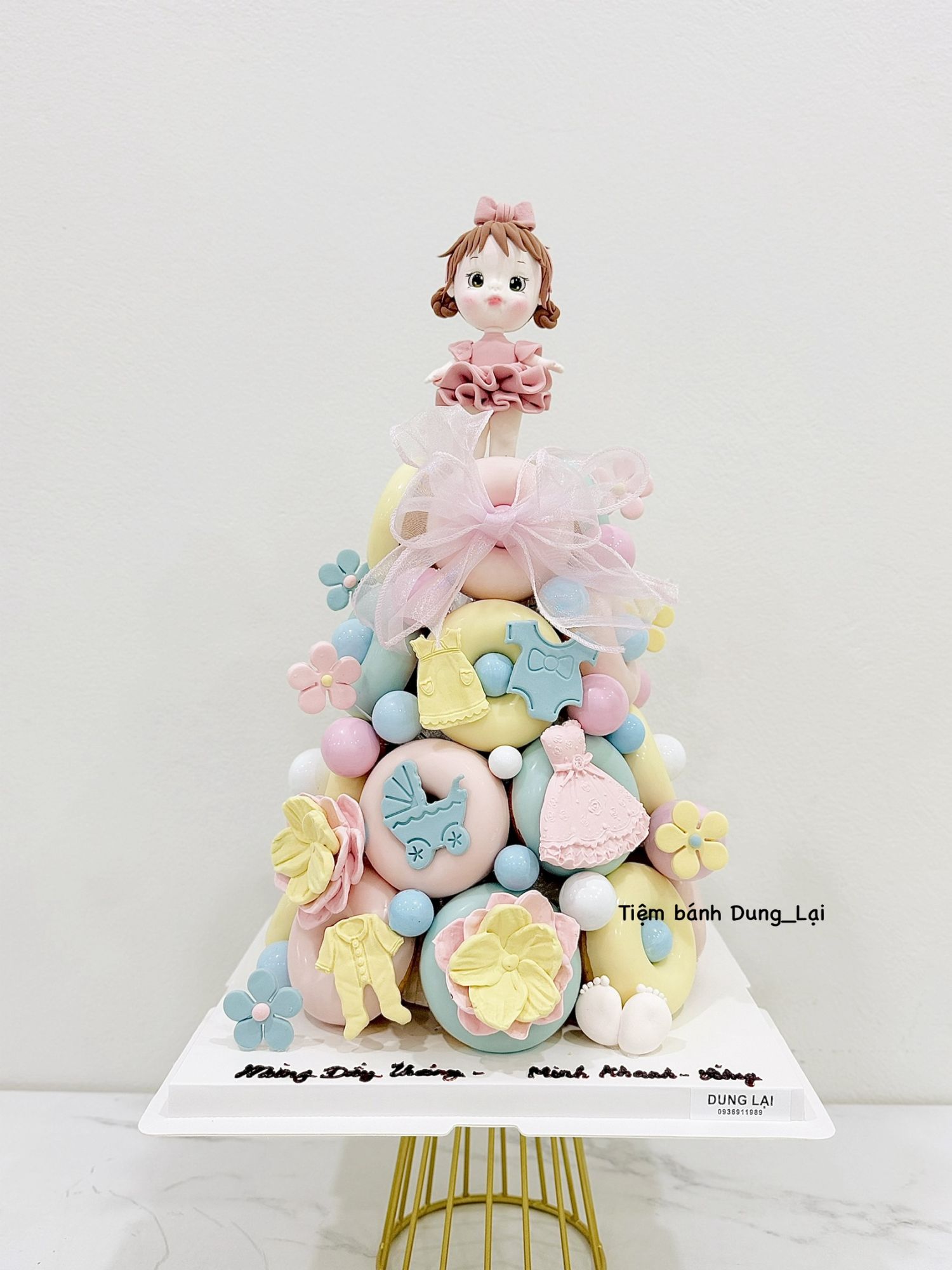 Tháp bánh donut bé gái tone pastel 24b