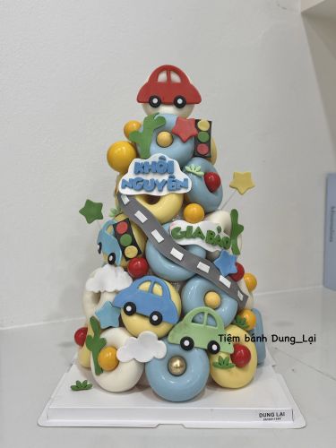 Tháp donut lớn bé trai, Bánh Sinh Nhật Donut, Bánh Sinh Nhật tháp bánh, Bánh Sinh Nhật tháp donut, Bánh Sinh Nhật bé trai, Bánh Sinh Nhật ô tô - Bánh Sinh Nhật Long Biên