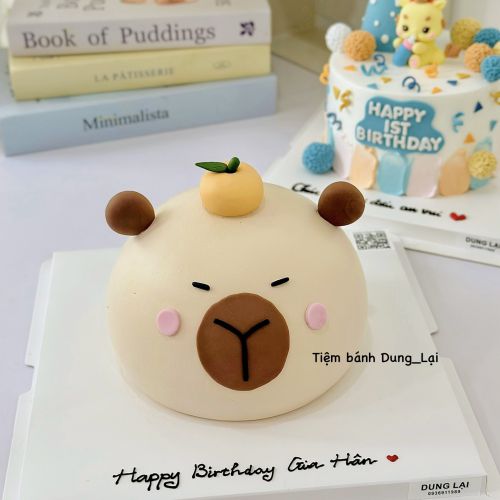 Bánh tạo hình capybara đội quả cam sz 16