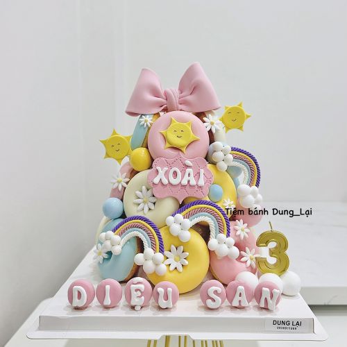 Tháp bánh donut bé gái cầu vồng - Bé gái